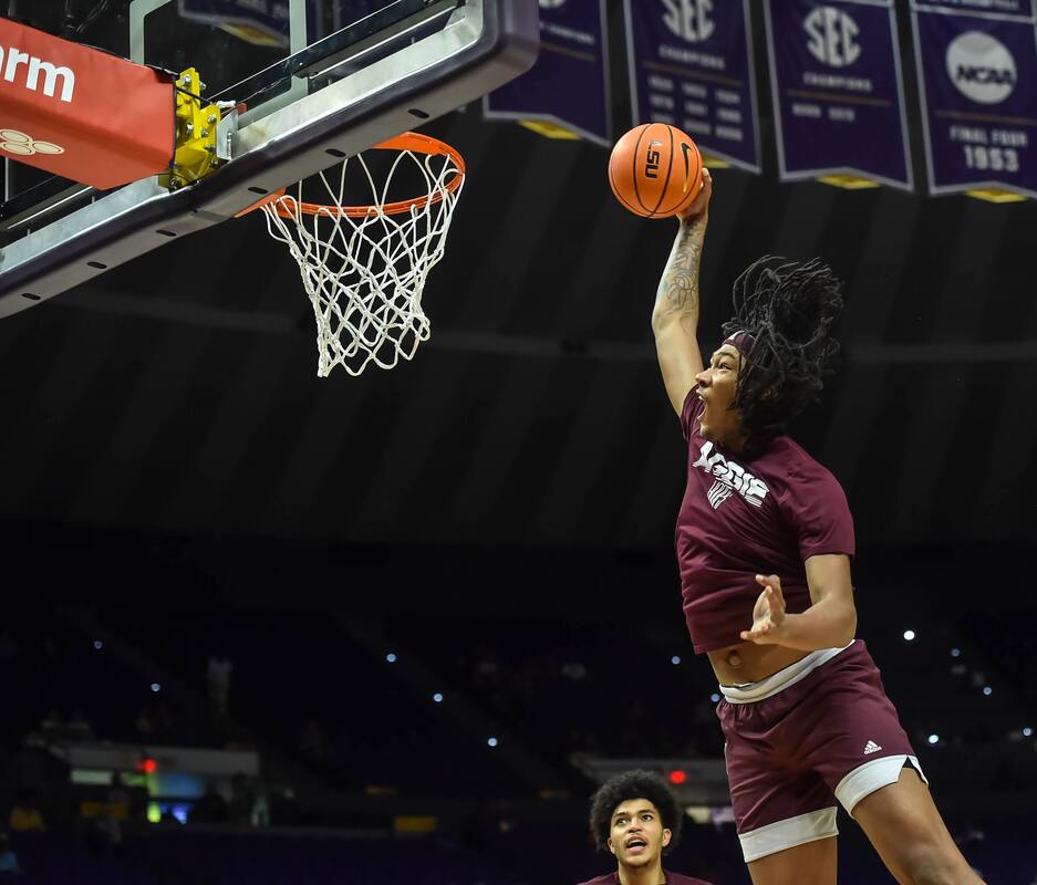 Texas A&M Aggies guard Dexter Dennis (0) tries to make a move on LSU Tigers  forward Tyrell Ward (15) during a college basketball game at the Pete  Maravich Assembly Center in Baton